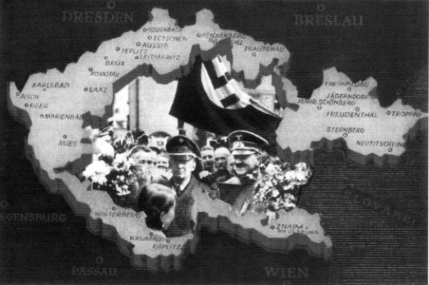 Schwarzes und weißes Foto einer Deutschlandkarte mit einer Gruppe von Menschen davor, einige halten Blumensträuße und eine Person hält eine Flagge, mit Text auf der Karte.