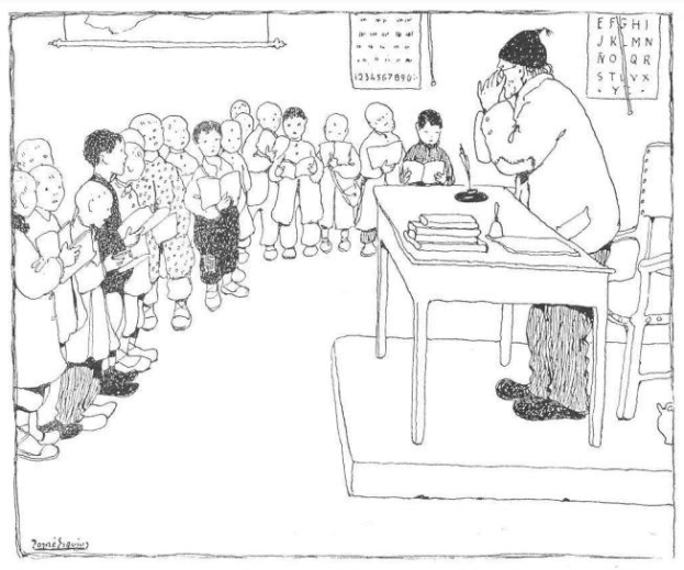 Ein Mann sitzt an einem Schreibtisch mit Büchern und Gegenständen vor einer Gruppe von Kindern, mit Papieren an der Wand hinter ihm, tragend Schuhe.