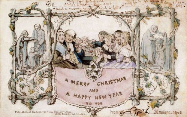 Eine Gruppe von Menschen in festlicher Kleidung versammelte sich um einen Tisch unter einem Banner mit der Aufschrift "Frohe Weihnachten und ein gutes Neues Jahr", sie strahlten und feierten die Festtage.