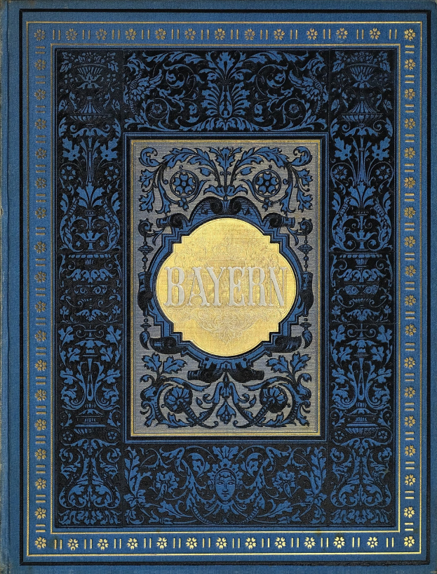 Blau-goldenes Buch mit "Bayern" darauf, verziert mit detailreichen Ornamenten.