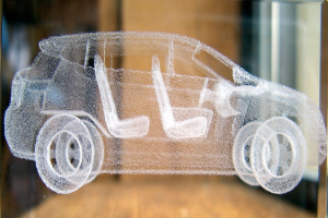 Ein imaginäres Auto in einer Szenerie dargestellt.