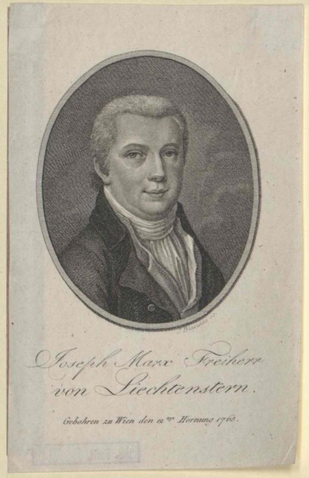 Portrait von Joseph Marx Freicher von Liechtenstein, einem deutschen Komponisten, in einem schwarzen Anzug und weißem Hemd mit ernstem Gesichtsausdruck, der ein Blatt Papier hält.